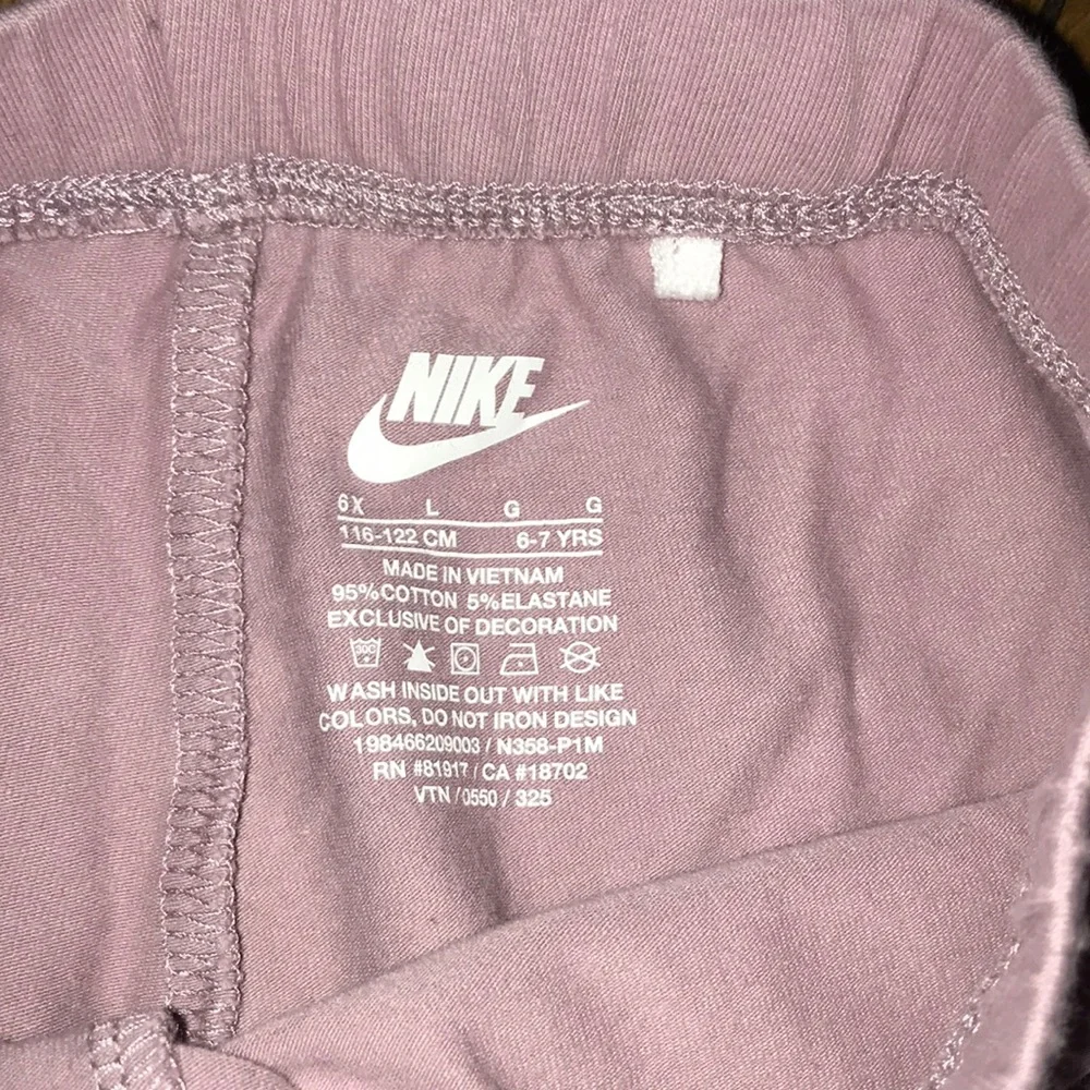 Nike Kids Light Pink Sweatpants with Black Swoosh